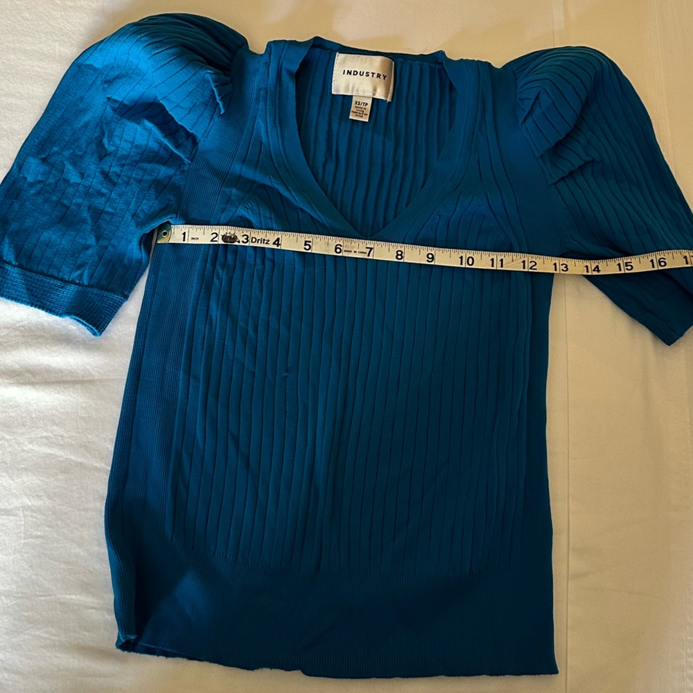 Textured, puff sleeve, blouse, beautiful blue it’s and Xs but fits like a small